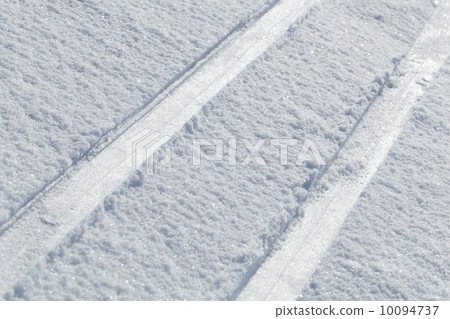 Macro of cross country skiing tracks in fresh snow 10094737