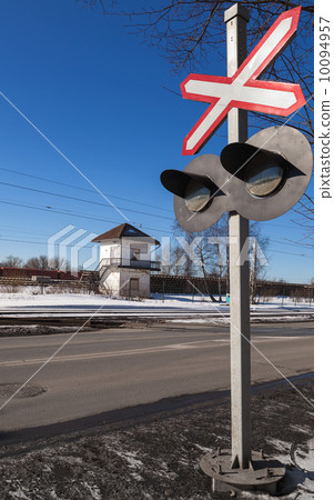 Railroad crossing. Red traffic sign with flashing lights Railroad crossing. Red traffic sign with flashing lights 10094957