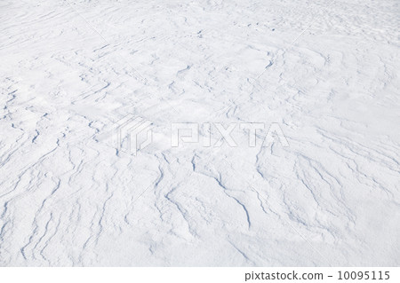 Abstract background texture of snowdrift with nice curved shadows 10095115