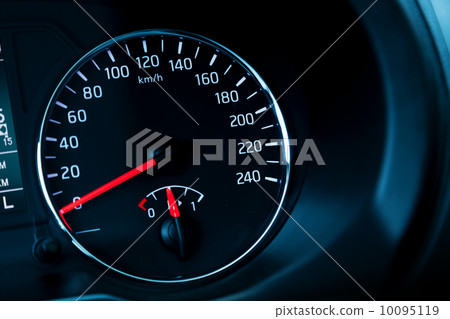 Closeup photo ob modern automotive speedometer on black Closeup photo ob modern automotive speedometer on black 10095119