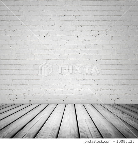 Abstract white interior with wooden floor and brick wall Abstract white interior with wooden floor and brick wall 10095125