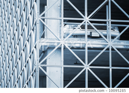 Business class car on upper floor of multi level parking 10095285