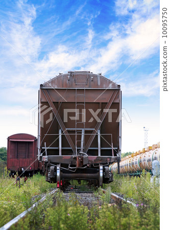 Cargo railway car stands on station. Front view Cargo railway car stands on station. Front view 10095750