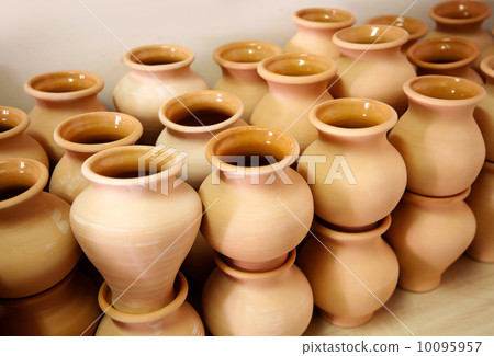 Pottery examples on the shelf in the art school 10095957