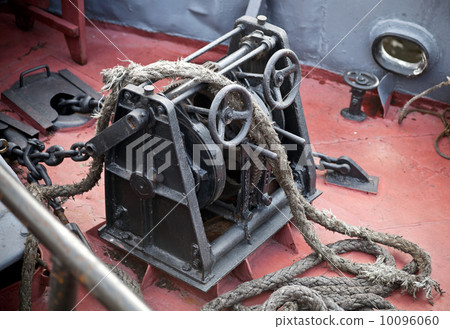 Anchor winch on a bow of small tugboat 10096060