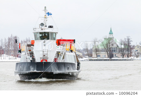 Small passenger ferry enters Helsinki port in winter season Small passenger ferry enters Helsinki port in winter season 10096204