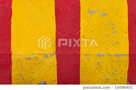 Red and yellow striped road barrier concrete wall texture Red and yellow striped road barrier concrete wall texture 10096401
