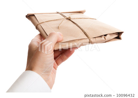Male hand delivers full envelope tied with a rope isolated on white background 10096432