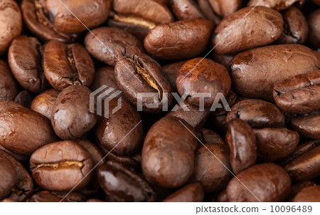 Macro background texture of roasted coffee beans Macro background texture of roasted coffee beans 10096489