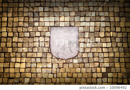 Golden mosaic wall with empty emblem element Golden mosaic wall with empty emblem element 10096492