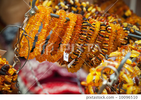 Amber beads and bracelets on the counter. Riga, Latvia Amber beads and bracelets on the counter. Riga, Latvia 10096510