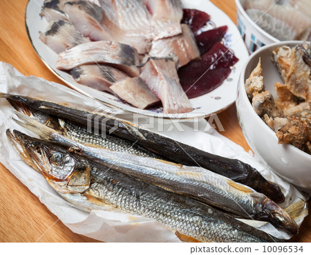 Assorted fish on wooden table. Seafood theme Assorted fish on wooden table. Seafood theme 10096534