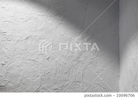 Abstract interior fragment. Corner of walls with white stucco 10096706