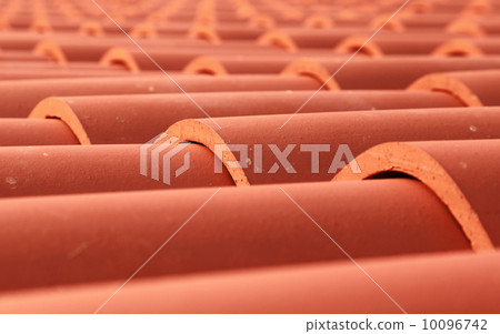 Red tile roof closeup photo with selective focus 10096742