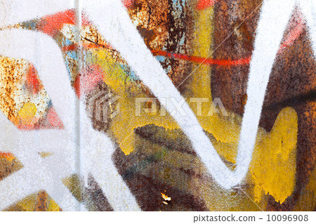 Abstract colorful graffiti fragment on rusted metal wall Abstract colorful graffiti fragment on rusted metal wall 10096908
