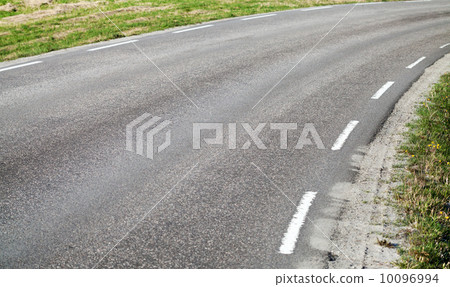 Turning asphalt road with marking lines Turning asphalt road with marking lines 10096994