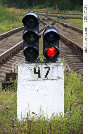 Railway semaphore shows red light 10097126