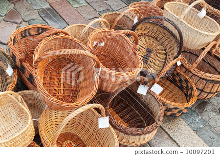 Row of handmade baskets on the street market place Row of handmade baskets on the street market place 10097201