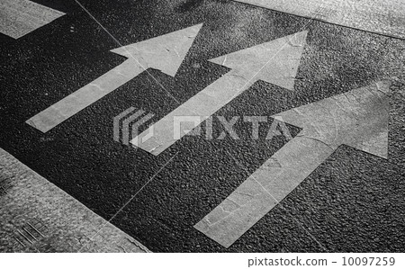 Pedestrian crossing road marking with white arrows on asphalt 10097259