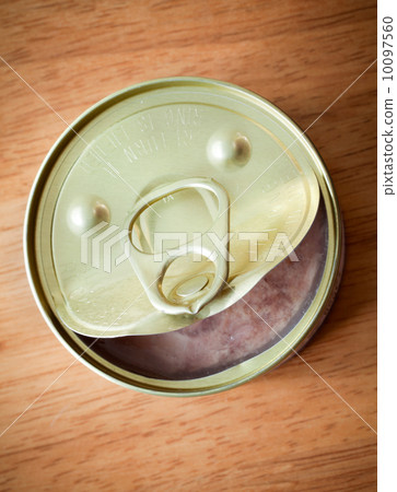 Fun smile of opened food can top view Fun smile of opened food can top view 10097560