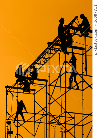 Silhouette of Workers on assembling concert stage Silhouette of Workers on assembling concert stage 10097711