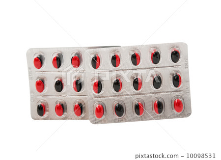 Medicine pills packed in blisters isolated 10098531