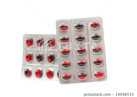 Medicine pills packed in blisters isolated 10098533