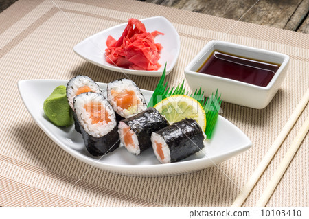 Traditional Maki sushi served with wasabi and ginger 10103410