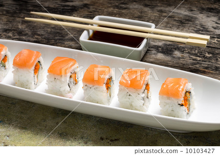 Seafood Sushi rolls in White Long Dish with soy sauce 10103427