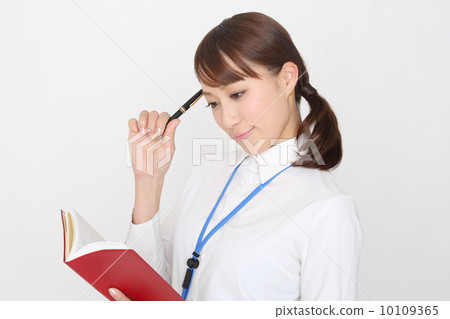 Business Woman to write in Notepad Business Woman to write in Notepad 10109365