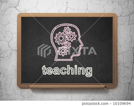 Education concept: Head With Gears and Teaching on chalkboard background 10109694