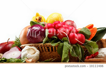 Healthy food. Fresh vegetables and fruits on a wooden board. Healthy food. Fresh vegetables and fruits on a wooden board. 10111486