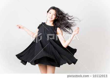 A woman in a black dress A woman in a black dress 10112013