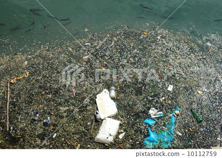Polluted river full of rubbish and fishes 10112759