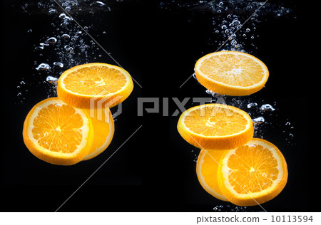slice of orange in the water with bubbles slice of orange in the water with bubbles 10113594