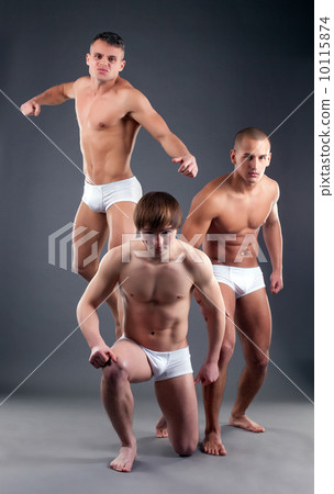Image of attractive male models advertising briefs 10115874