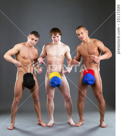 Shot of attractive young naked men posing in caps Shot of attractive young naked men posing in caps 10115886