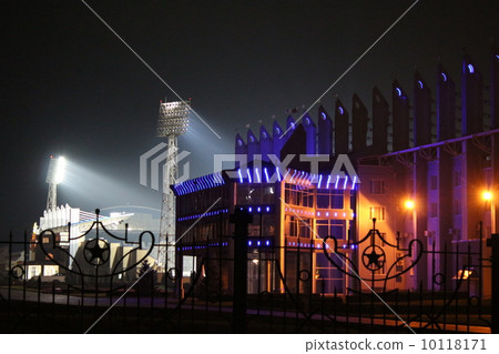 Illuminated stadium at night 10118171