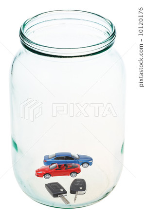new vehicle and keys in glass jar 10120176