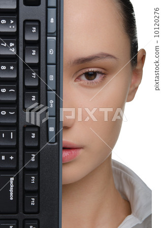 Woman's face covered keyboard 10120276