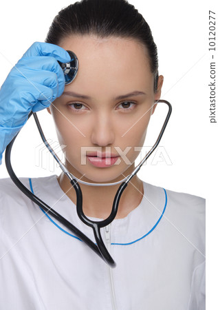 Doctor listens to a stethoscope Doctor listens to a stethoscope 10120277