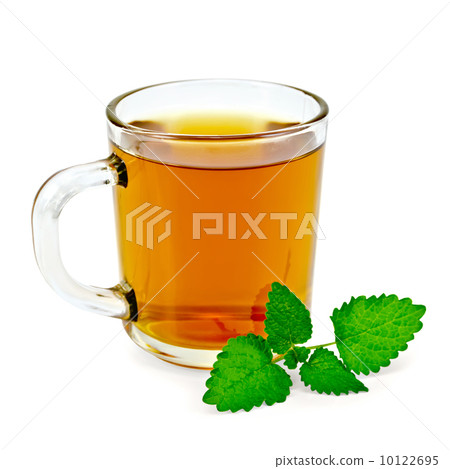 Herbal tea with melissa in a mug 10122695