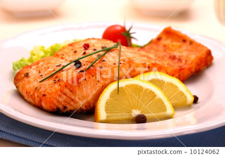 Grilled salmon filet and vegetables Grilled salmon filet and vegetables 10124062