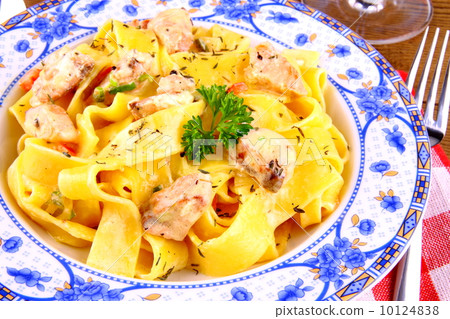 Salmon fish with taglateli and fork Salmon fish with taglateli and fork 10124838