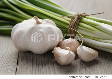 bunch of fresh green onions and garlic 10125468