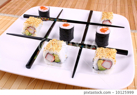 Tic tac toe from chopsticks and Sushi 10125999