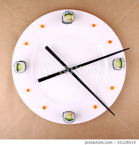 Clock Concept with sushi on white plate Clock Concept with sushi on white plate 10126014