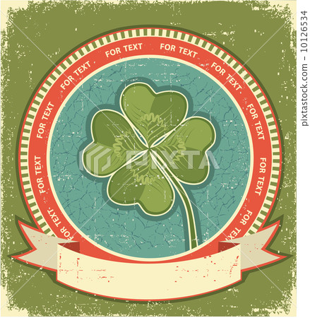 Clover label on grunge old paper background with scroll for text Clover label on grunge old paper background with scroll for text 10126534