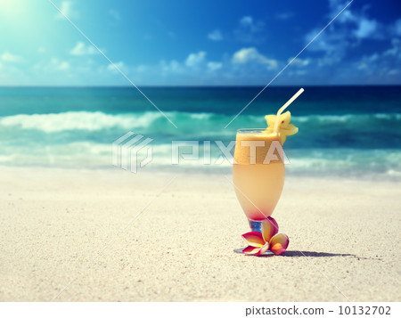 fresh fruit mix of juices on a tropical beach fresh fruit mix of juices on a tropical beach 10132702