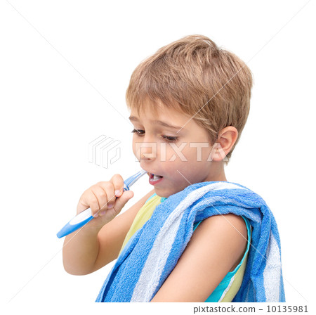 Little boy brushing his teeth 10135981